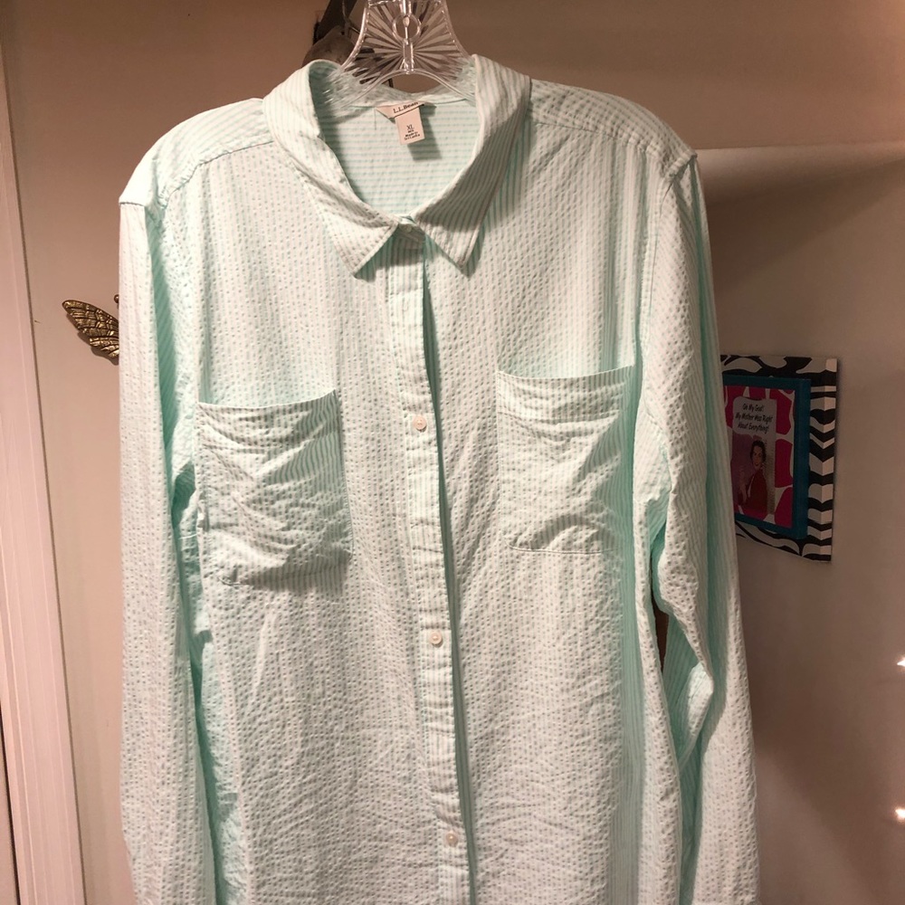 Green/white striped seersucker button-down shirt.